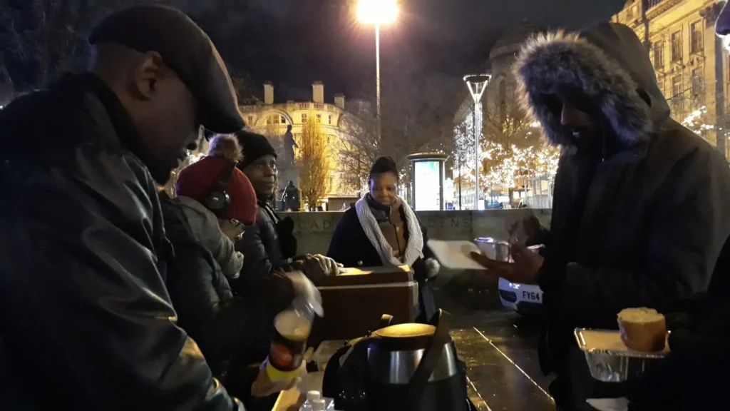 KICC The City of Refuge volunteers distributing meals during Manchester homeless outreach